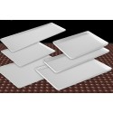 Taca cukiernicza aluminiowa 40x30 cm - sześć tac w różnych rozmiarach na ciemnym tle
