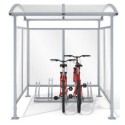 Wiata rowerowa Zorza zabudowana na 5 rowerów - widok z przodu z dwoma rowerami
