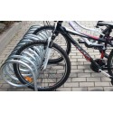 Stojak na rowery VIRO PION 125 cm - spiralny stojak z zaparkowanymi rowerami na kostce